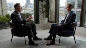 Video still of BCG expert Matthias Tauber interviewing Al Cook, CEO of DeBeers