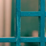 Close-up of blue wooden window pane