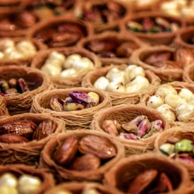 Close-up of nuts in wicker baskets