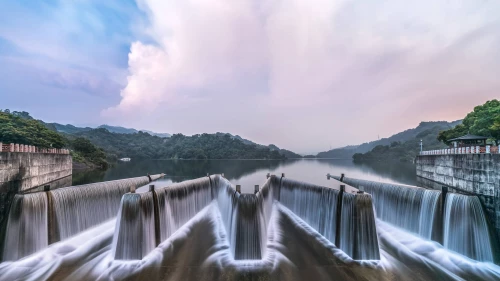 Panoramic shot of dam on water against sky