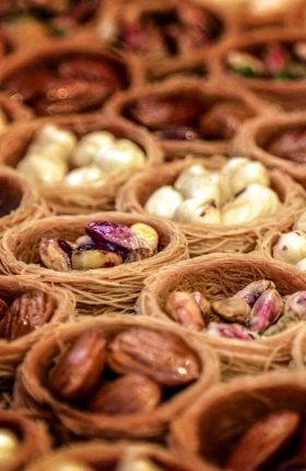 Close-up of nuts in wicker baskets