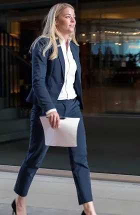 Business women walking down street