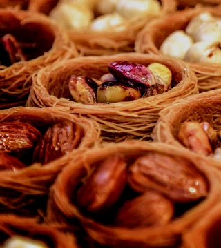 Close-up of nuts in wicker baskets