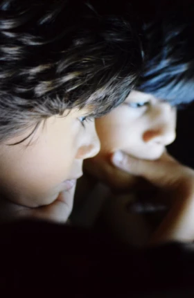 CLOSE-UP OF A YOUNG WOMAN WITH EYES CLOSED