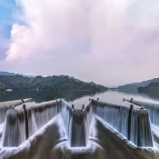 Panoramic shot of dam on water against sky