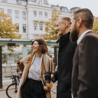group of colleagues laughing together