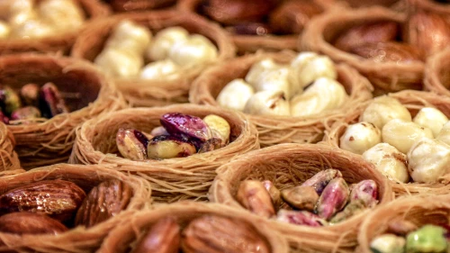 Close-up of nuts in wicker baskets