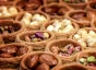 Close-up of nuts in wicker baskets