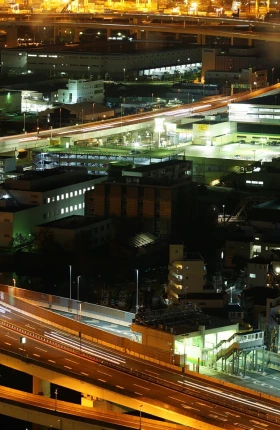 Image of a Highway Winding through a City at Night