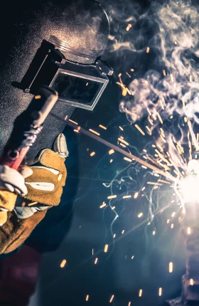 Man burning metal